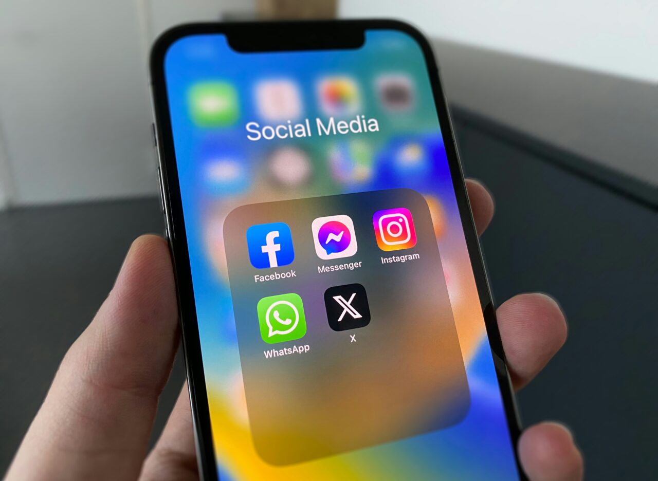 a phone with social media icons