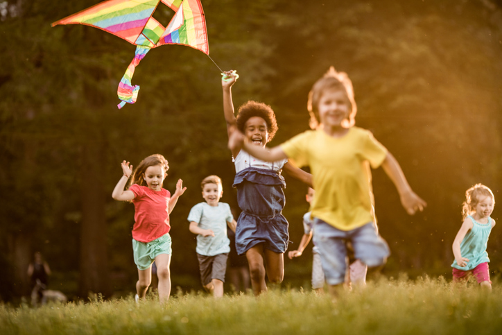 children playing with kite